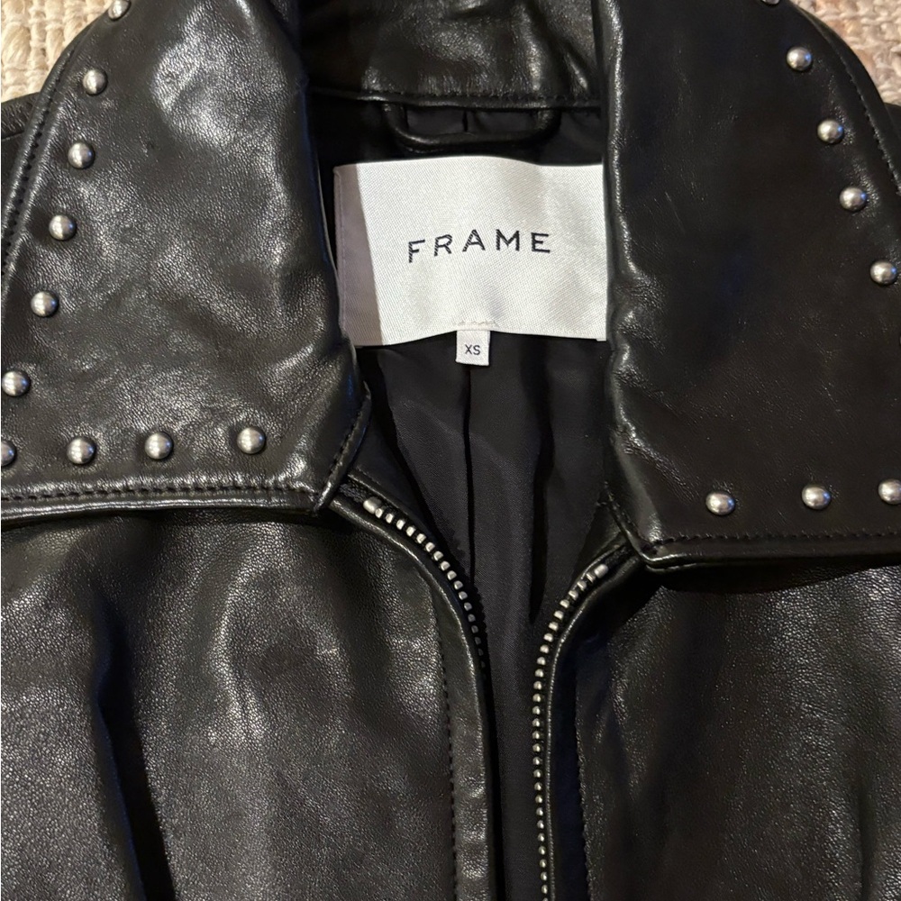 Authentic Frame Noir Lambskin leather jacket with silver stud detailing.